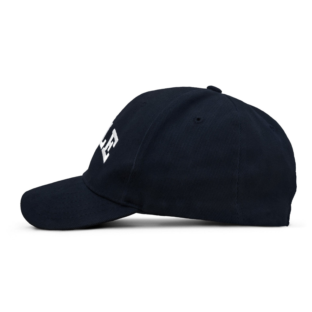 Navy baseball cap side view with partial white YALE lettering near crown.