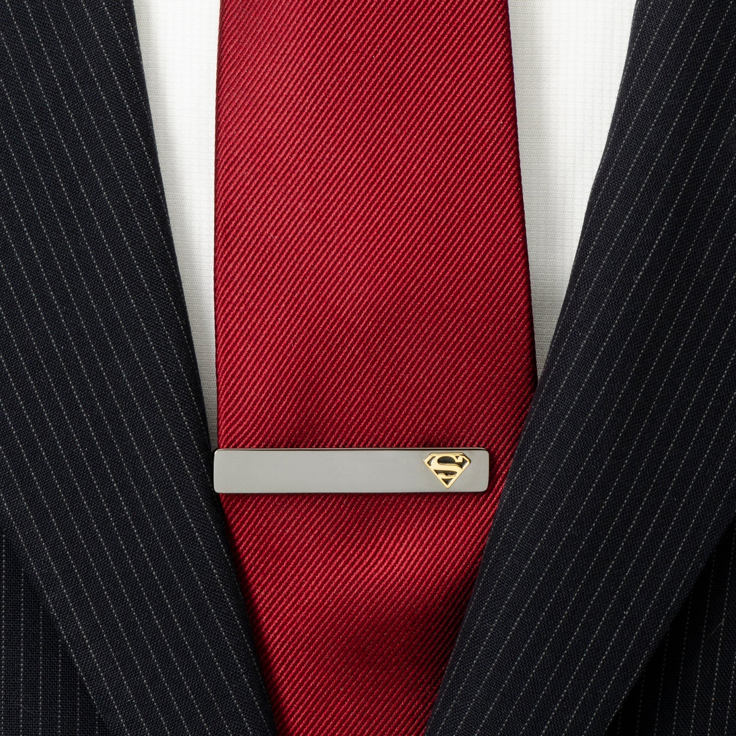 DC Superman Black and Gold Tie Clip - close-up detail view