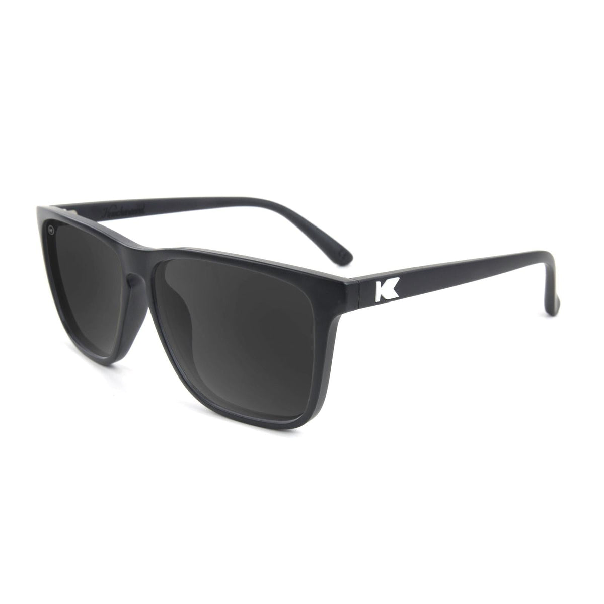 Black sunglasses with dark smoke lenses and matching black frame arms