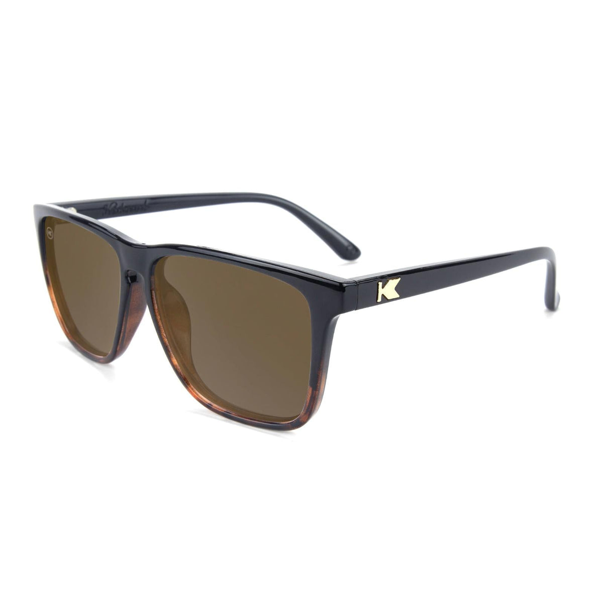 Black sunglasses with brown mirrored lenses and tinted amber details on frame