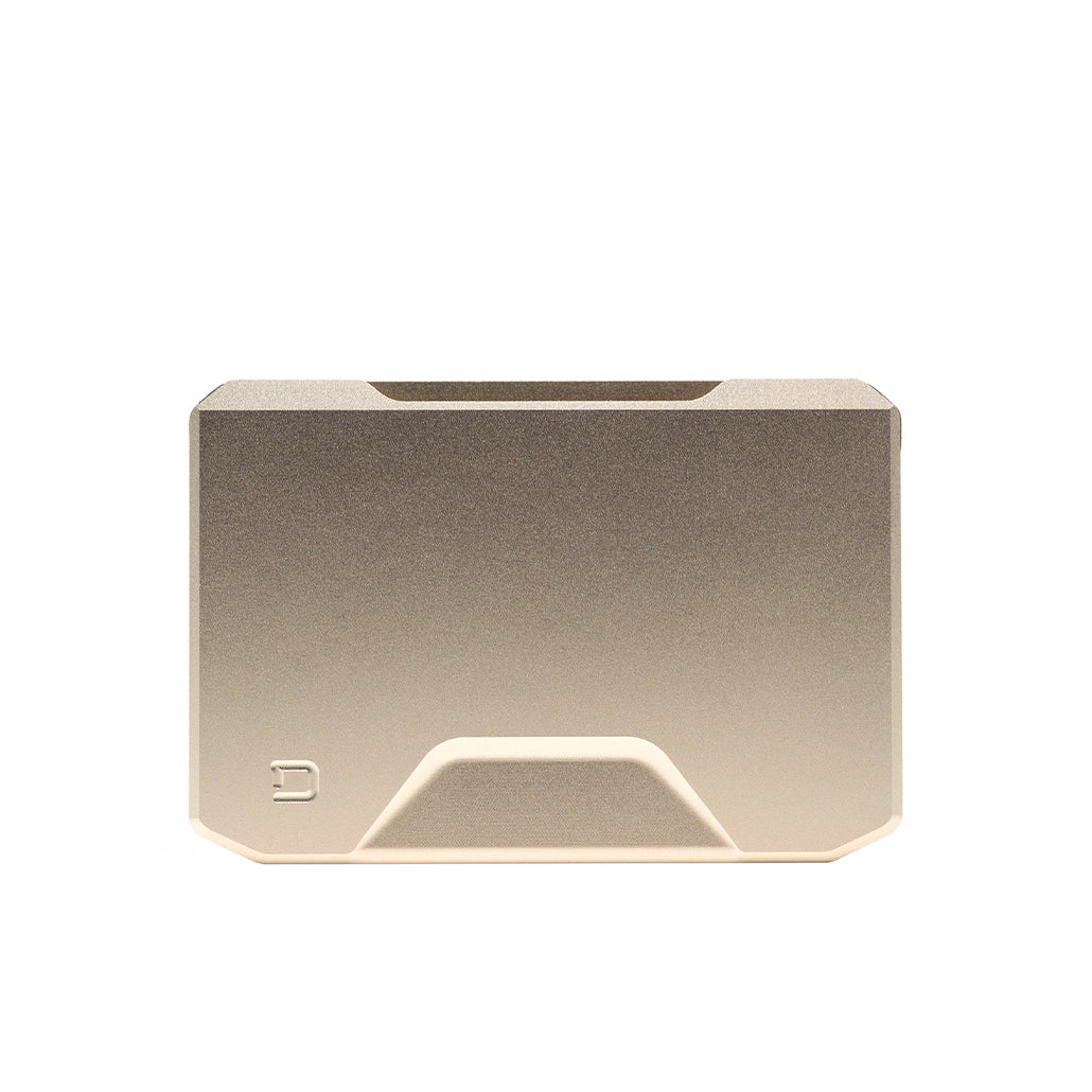 Satin gold Dango SK1 Slide Kick Wallet showing its sculpted front