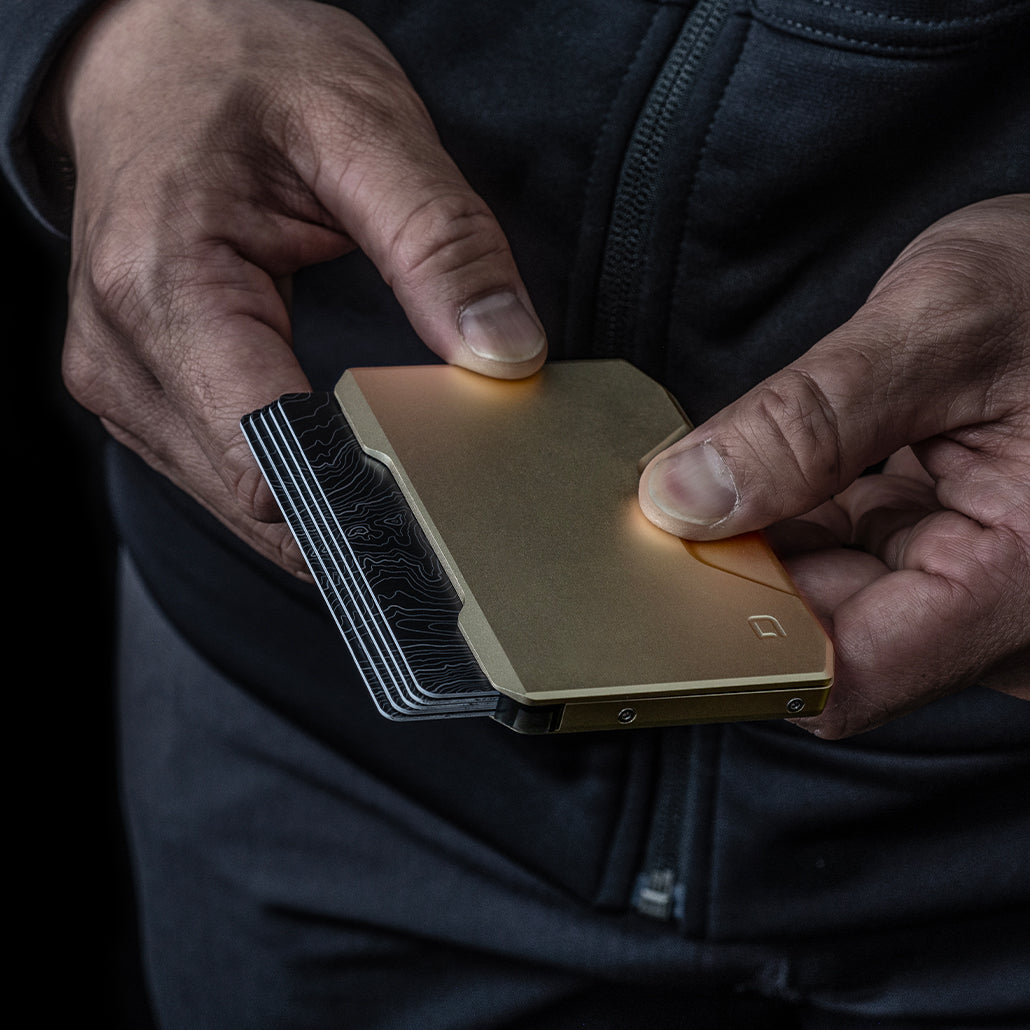 Dango SK1 Slide Kick Wallet holding several cards, viewed from the side