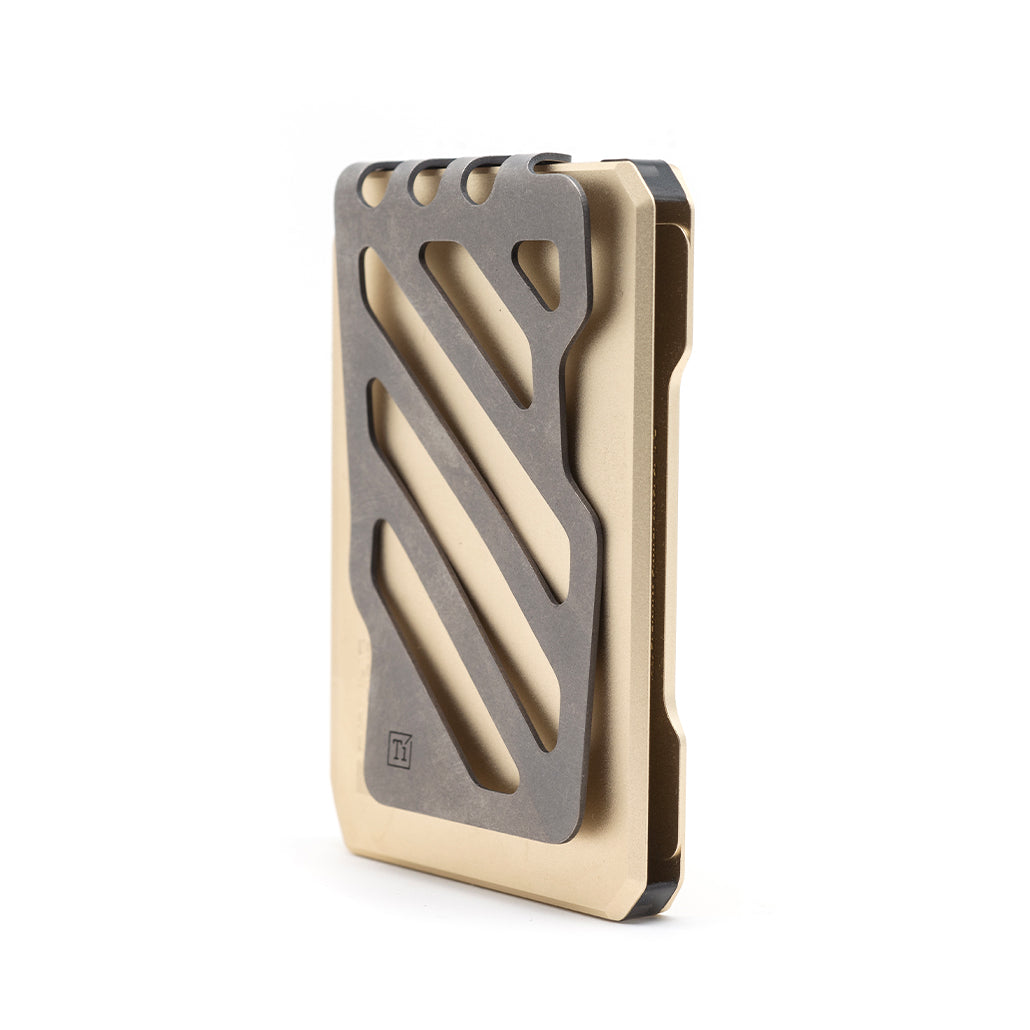 Champagne gold slide-kick wallet with metal money clip, side view showing stacked cards