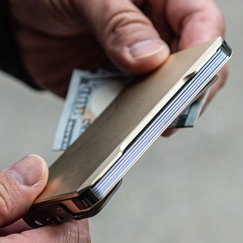 Champagne gold slide kick wallet with stacked card edges and exposed money clip